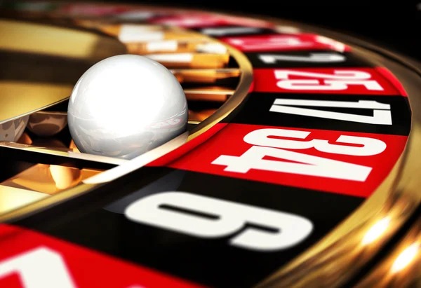 Live Caribbean Stud Poker table at 888poker with professional dealer and multiple players